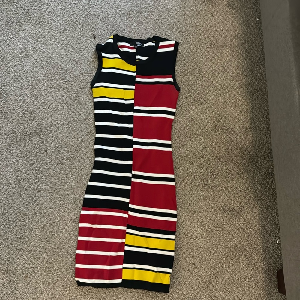 Patterned mini dress fits tight size small